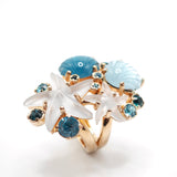 Anello con cristalli color acquamarina e resine a forma di conchiglia e stella marina Amea Luxury