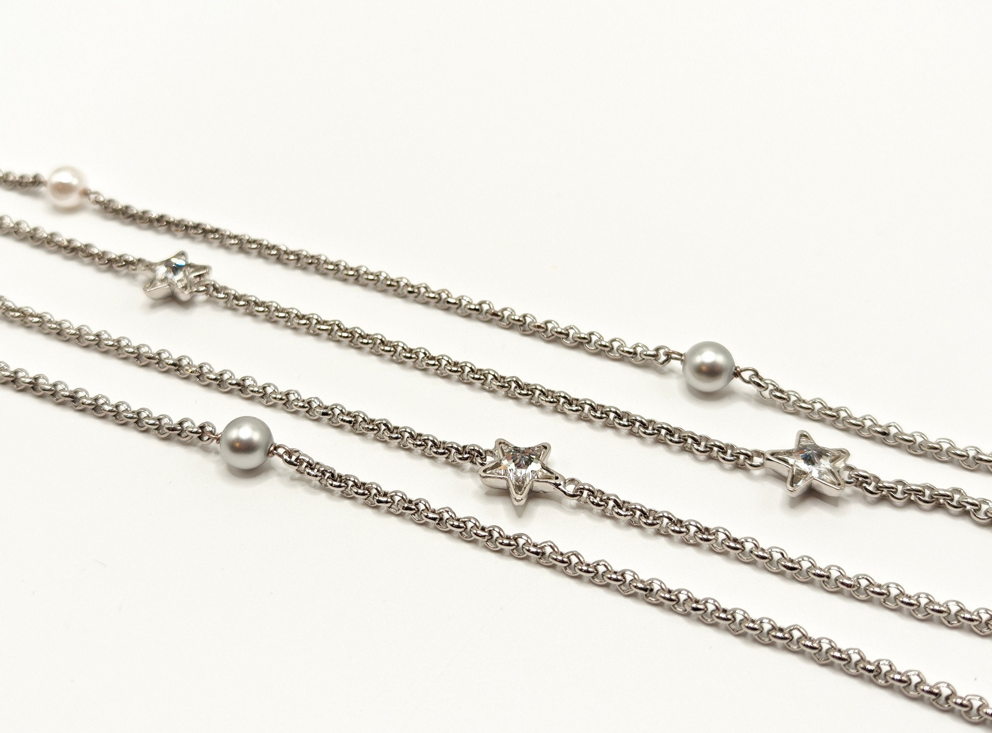 Collana a doppio filo con perle bianche e grigie e cristalli a stella Amea Luxury